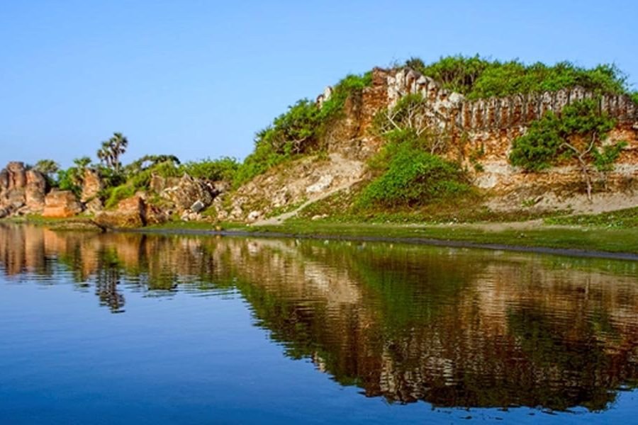Ruined brick walls of Alamparai Fort near the backwater lagoon