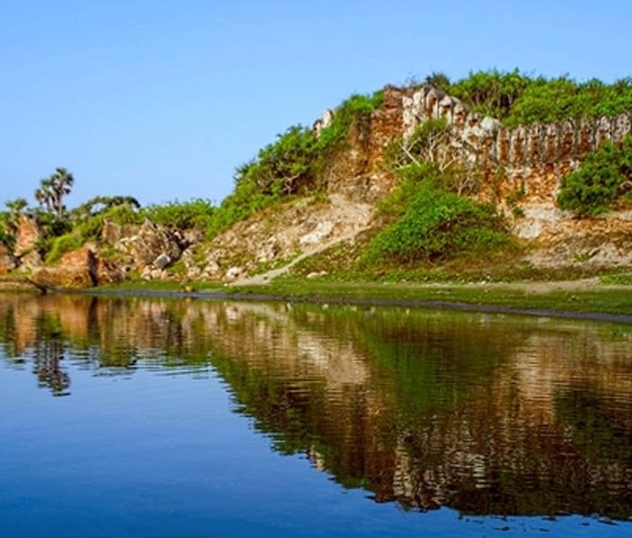 Brick ruins of Alamparai Fort beside the backwaters near the sea