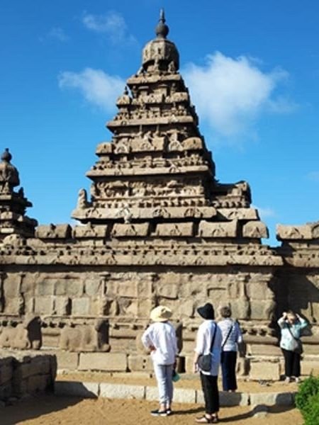 Ancient Pallava rock-cut monuments at Mahabalipuram under a clear sky