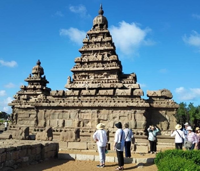 Ancient Pallava rock-cut monuments at Mahabalipuram under a clear sky