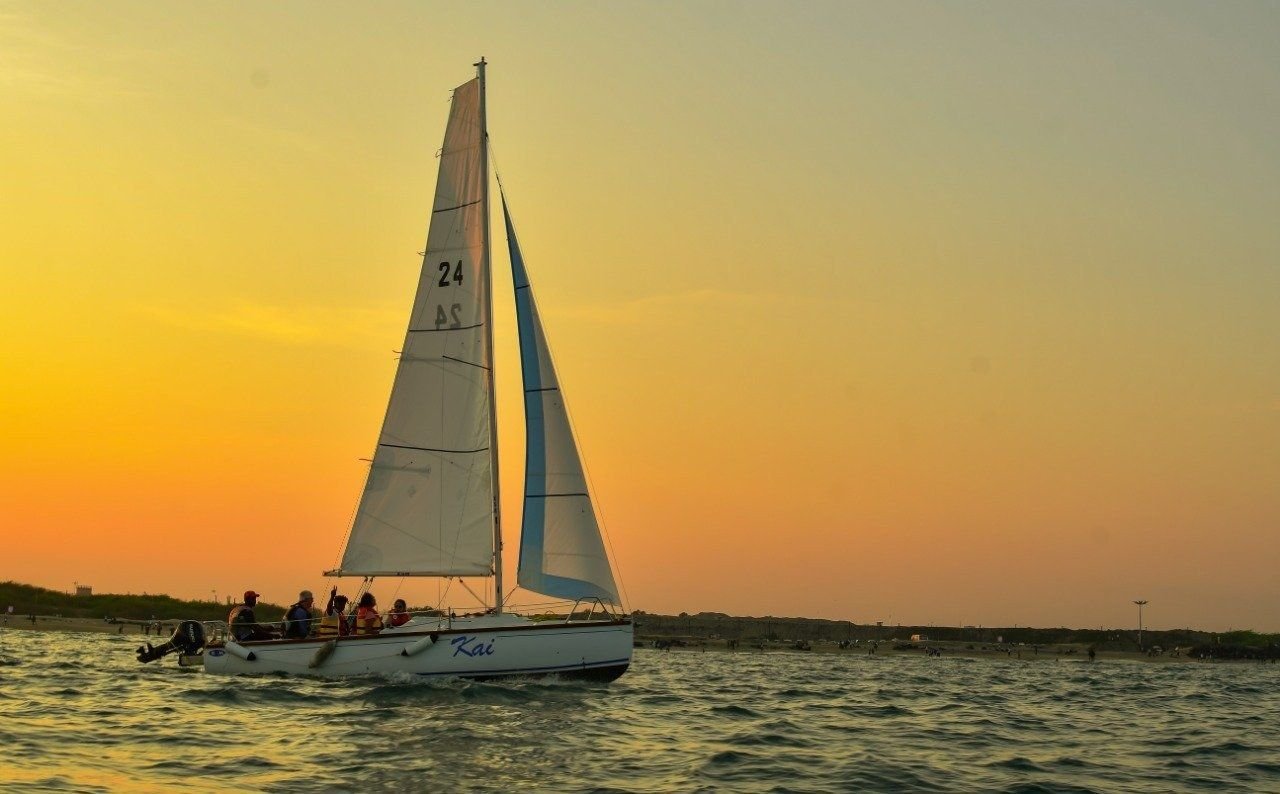 A sailboat at sunset on the Bay of Bengal off Pondicherry