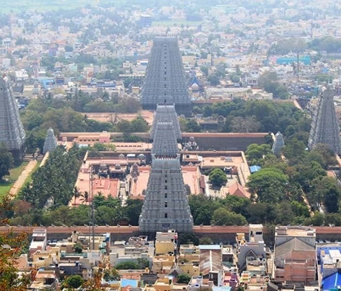 Temple towers of Tiruvannamalai with the Arunachala hill in the background