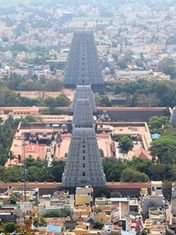 Temple towers of Tiruvannamalai with the Arunachala hill in the background